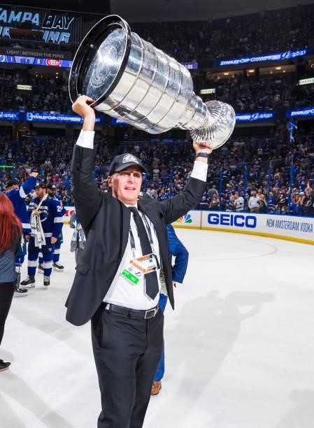 Mathieu Darche, Director Of Hockey Operations of the Tampa Bay Lightning hoists the Stanley Cup overhead after the Tampa Bay Lightning defeated the...