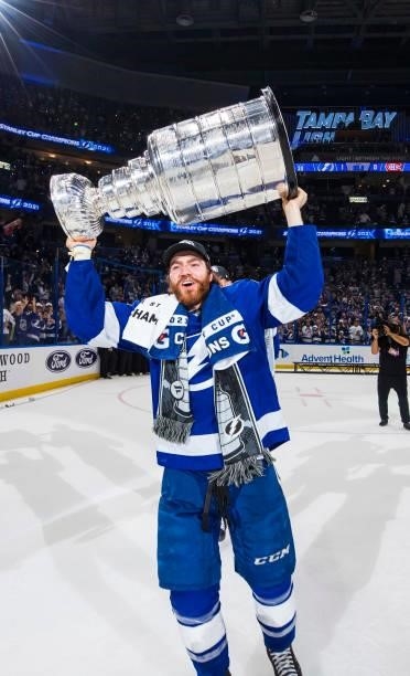 Brayden Point of the Tampa Bay Lightning hoists the Stanley Cup overhead after the Tampa Bay Lightning defeated the Montreal Canadiens in Game Five...