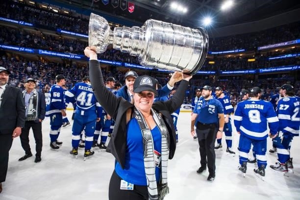 Director of Hockey Administration Liz Koharski of the Tampa Bay Lightning hoists the Stanley Cup overhead after the Tampa Bay Lightning defeated the...