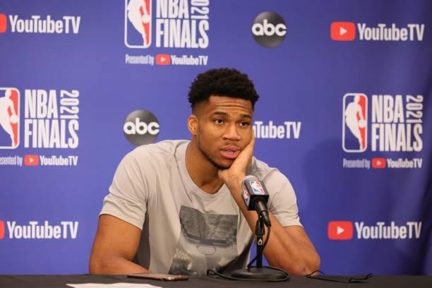 Giannis Antetokounmpo of the Milwaukee Bucks talks with the media after the game against the Phoenix Suns during Game Two of the 2021 NBA Finals on...