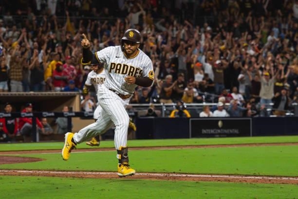 Trent Grisham of the San Diego Padres hits a walk-off single against the Washington Nationals on July 8, 2021 at Petco Park in San Diego, California.