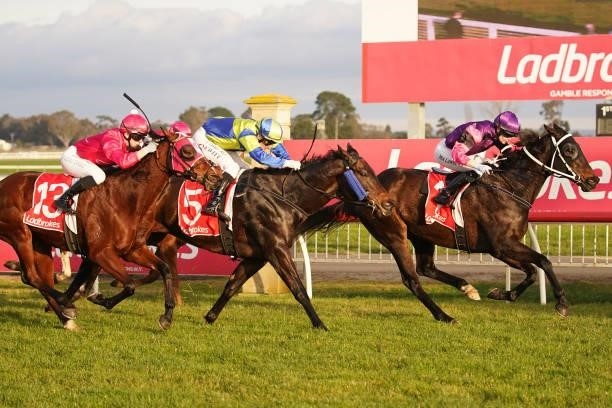 Rolling Moss ridden by Mikaela Lawrence wins the Harvey Norman Gippsland BM64 Handicap at Sale Racecourse on July 09, 2021 in Sale, Australia.