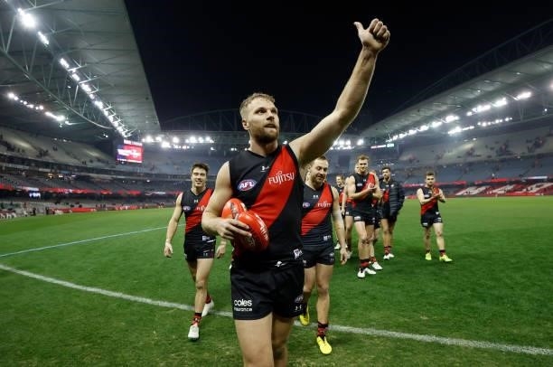 Jake Stringer of the Bombers celebrates after his 150th match during the 2021 AFL Round 17 match between the Essendon Bombers and the Adelaide Crows...