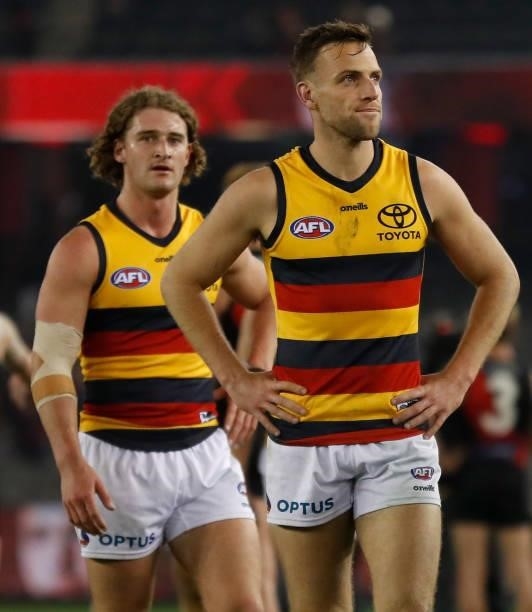 Brodie Smith of the Crows looks dejected after a loss during the 2021 AFL Round 17 match between the Essendon Bombers and the Adelaide Crows at...
