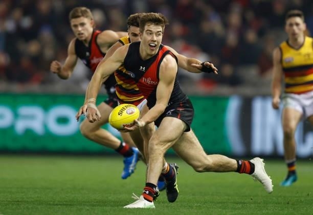Zach Merrett of the Bombers in action during the 2021 AFL Round 17 match between the Essendon Bombers and the Adelaide Crows at Marvel Stadium on...