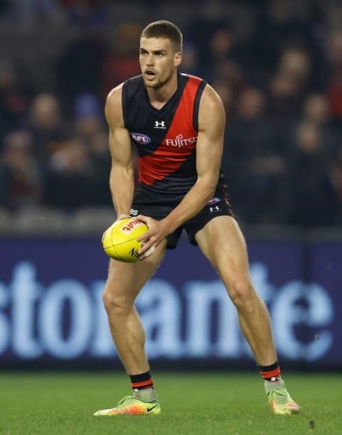 Tom Cutler of the Bombers in action during the 2021 AFL Round 17 match between the Essendon Bombers and the Adelaide Crows at Marvel Stadium on July...