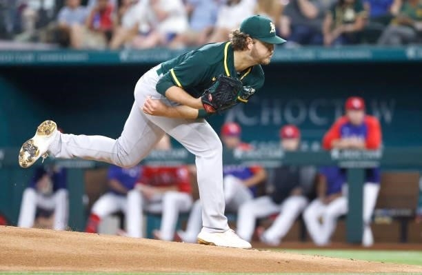 Cole Irvin of the Oakland Athletics delivers against the Texas Rangers during the first inning at Globe Life Field on July 9, 2021 in Arlington,...