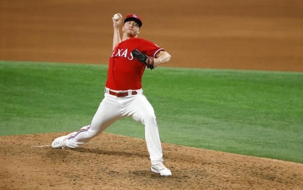 Josh Sborz of the Texas Rangers pitches against the Oakland Athletics during the seventh inning at Globe Life Field on July 9, 2021 in Arlington,...