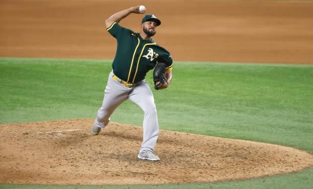 Deolis Guerra of the Oakland Athletics pitches against the Texas Rangers during the eighth inning at Globe Life Field on July 9, 2021 in Arlington,...
