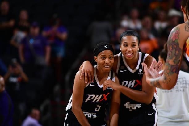 Shey Peddy of the Phoenix Mercury and Megan Walker of the Phoenix Mercury smile after the win against the Seattle Storm on July 9, 2021 at Phoenix...