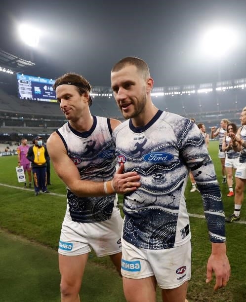Lachie Henderson and Sam Menegola of the Cats celebrate during the 2021 AFL Round 17 match between the Carlton Blues and the Geelong Cats at the...