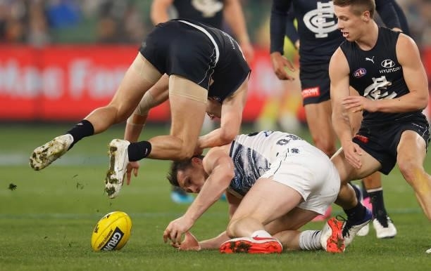 Patrick Dangerfield of the Cats gives away a contact below the knees free kick during the 2021 AFL Round 17 match between the Carlton Blues and the...