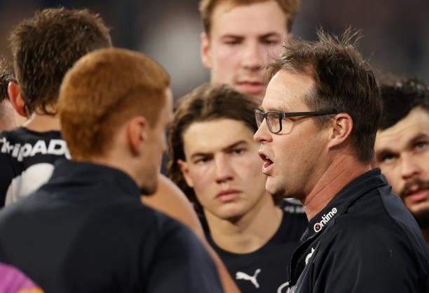 David Teague, Senior Coach of the Blues addresses his players during the 2021 AFL Round 17 match between the Carlton Blues and the Geelong Cats at...