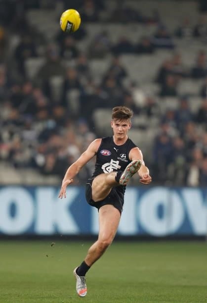 Paddy Dow of the Blues kicks the ball during the 2021 AFL Round 17 match between the Carlton Blues and the Geelong Cats at the Melbourne Cricket...
