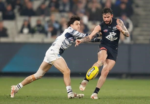 Zac Williams of the Blues and Brad Close of the Cats compete for the ball during the 2021 AFL Round 17 match between the Carlton Blues and the...