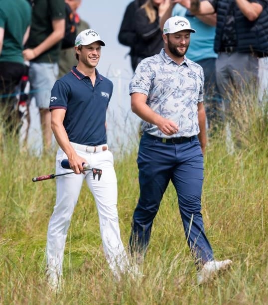 Thomas Dutry and Jon Rahm are pictured during day three of the abrdn Scottish Open at the Renaissance Club on July 10 in North Berwick, Scotland.