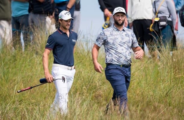 Thomas Dutry and Jon Rahm are pictured during day three of the abrdn Scottish Open at the Renaissance Club on July 10 in North Berwick, Scotland.