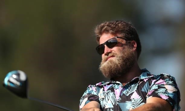 Athlete NFL athlete Ryan Fitzpatrick tees off on the 10th hole during round two of the American Century Championship at Edgewood Tahoe South golf...