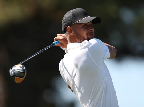 Athlete Steph Curry tees off on the third hole of the American Century Championship at Edgewood Tahoe South golf course on July 10, 2020 in South...