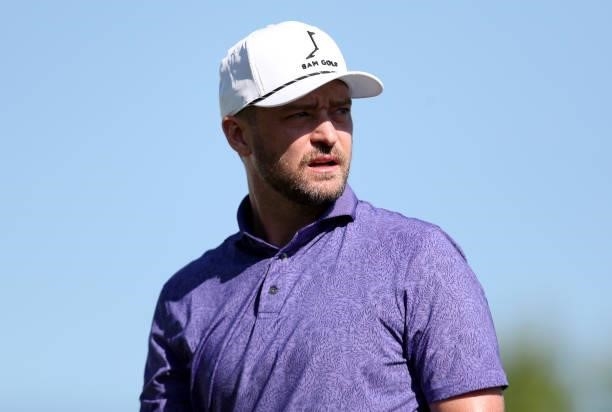Musician Justin Timberlake looks on from the first hole during round two of the American Century Championship at Edgewood Tahoe South golf course on...