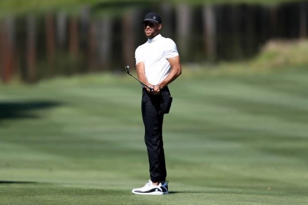 Athlete Steph Curry hits a shot on the second hole during round two of the American Century Championship at Edgewood Tahoe South golf course on July...
