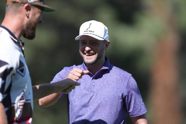 Musician Justin Timberlake smiles on the second hole during round two of the American Century Championship at Edgewood Tahoe South golf course on...