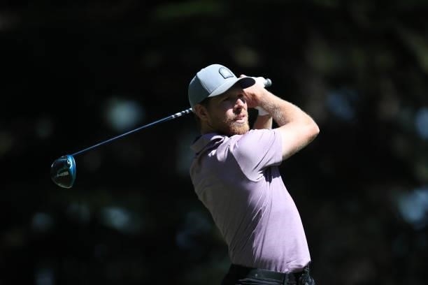 Athlete Joe Pavelski tees off on the 4th hole of the American Century Championship at Edgewood Tahoe South golf course on July 10, 2020 in South Lake...