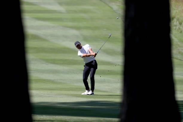 Athlete Steph Curry hits a shot on the third hole of the American Century Championship at Edgewood Tahoe South golf course on July 10, 2020 in South...