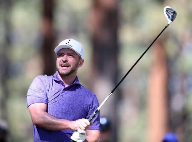 Musician Justin Timberlake tees off on the second hole during round two of the American Century Championship at Edgewood Tahoe South golf course on...