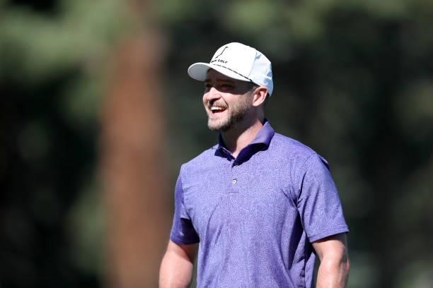 Musician Justin Timberlake smiles on the second hole during round two of the American Century Championship at Edgewood Tahoe South golf course on...