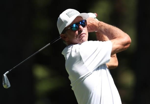 Former NHL athlete Mike Modano tees off on the 4th hole of the American Century Championship at Edgewood Tahoe South golf course on July 10, 2020 in...