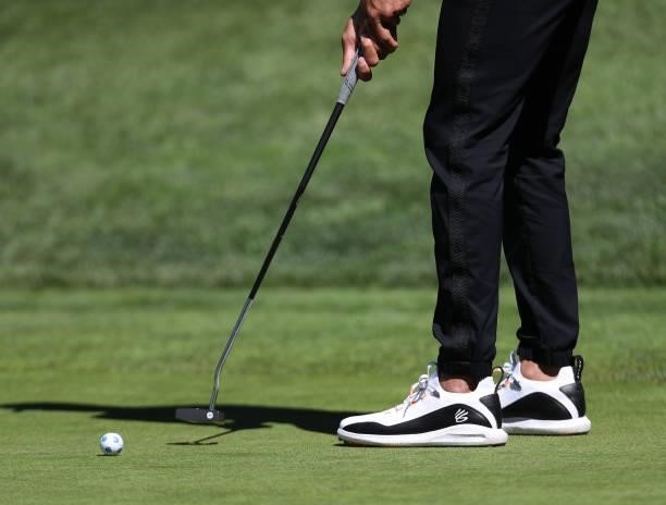 Athlete Steph Curry putts on the third hole of the American Century Championship at Edgewood Tahoe South golf course on July 10, 2020 in South Lake...