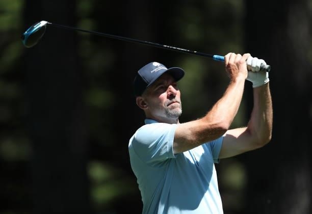 Former MLB athlete John Smoltz tees off on the 4th hole of the American Century Championship at Edgewood Tahoe South golf course on July 10, 2020 in...