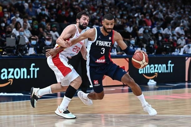 Timothe LUWAWU CABARROT of France and Sergio LLULL of Spain during the preparation for Olympic Games basketball match between France and Spain at...