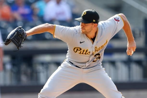 Pitcher Tyler Anderson the Pittsburgh Pirates delivers a pitch against the New York Mets during the third inning of game one of a double header at...