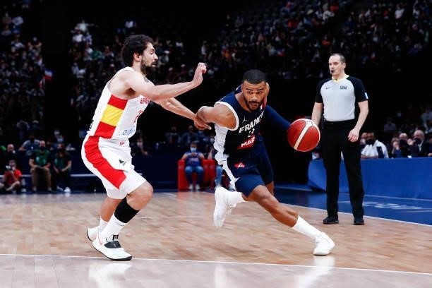 Timothe Luwawu-Cabarrot of France drives to the basket against Sergio Llull of Spain during the preparation for Olympic Games basketball match...