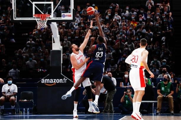 Moustapha Fall of France goes to the basket against Marc Gasol of Spain during the preparation for Olympic Games basketball match between France and...