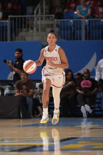 Natasha Cloud of the Washington Mystics dribbles the ball against the Chicago Sky on July 10, 2021 at the Wintrust Arena in Chicago, Illinois. NOTE...