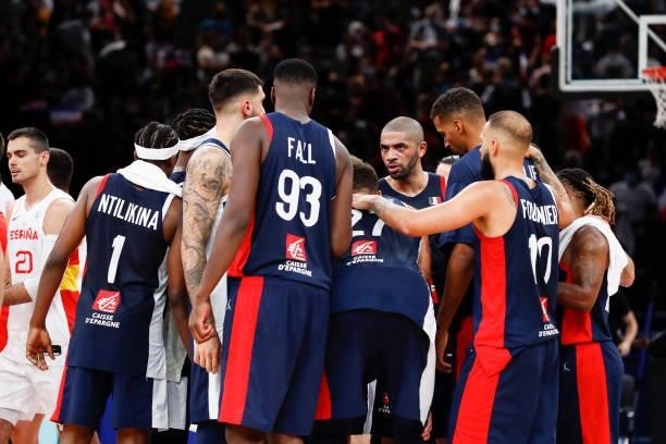 Nicolas Batum of France talks to his teammates after the preparation for Olympic Games basketball match between France and Spain at Accor Arena on...