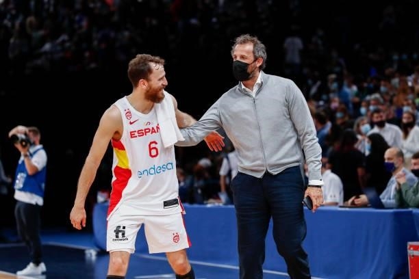 Sergio Rodriguez of Spain salutes Antoine Rigaudeau former international French basketball player after the preparation for Olympic Games basketball...