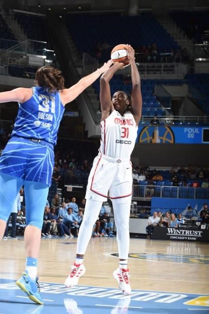 Tina Charles of the Washington Mystics shoots the ball over Stefanie Dolson of the Chicago Sky on July 10, 2021 at the Wintrust Arena in Chicago,...