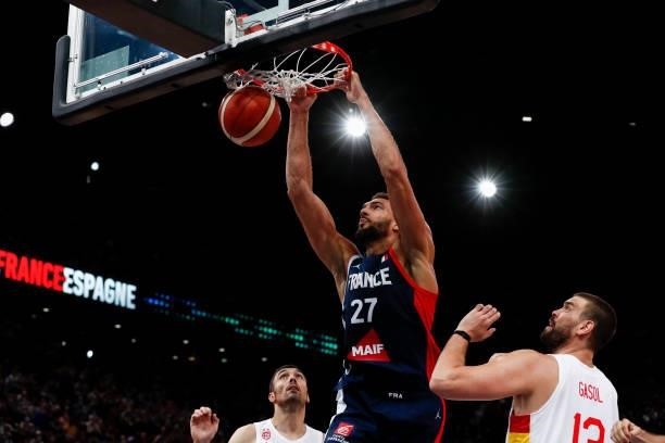 Rudy Gobert of France is at the basket against Pierre Oriola of Spain and Marc Gasol of Spain during the preparation for Olympic Games basketball...