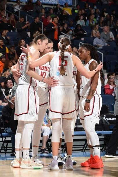 The Washington Mystics huddle up during the game against the Chicago Sky on July 10, 2021 at the Wintrust Arena in Chicago, Illinois. NOTE TO USER:...