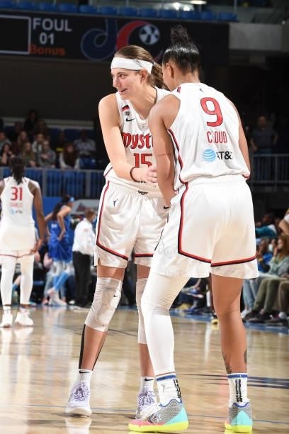 Sydney Wiese of the Washington Mystics and teammate Natasha Cloud celebrate after the game against the Chicago Sky on July 10, 2021 at the Wintrust...