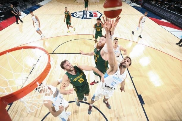Aron Baynes of the Australia Men's National Team and Marcos Delia of the Argentina Men's National Team fight for the rebound on July 10, 2021 at...