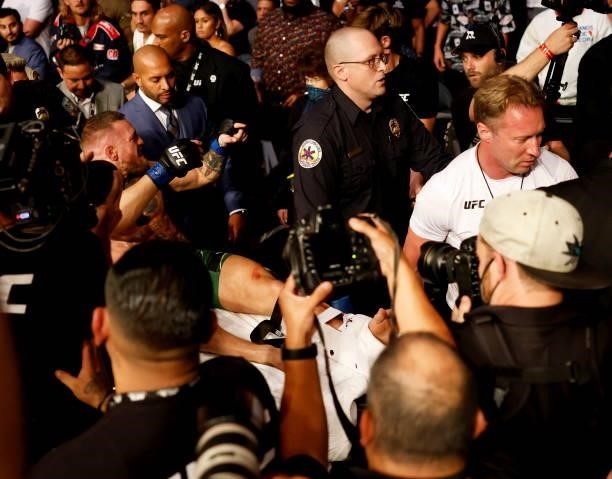 Nevada , United States - 10 July 2021; Conor McGregor leaves the arena on a stretcher following his lightweight fight with Dustin Poirier during the...