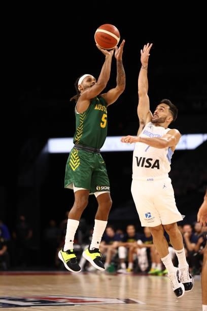 Facundo Campazzo of the Argentina Men's National Team attempts to block a shot by Patty Mills of the Australia Men's National Team during the game on...