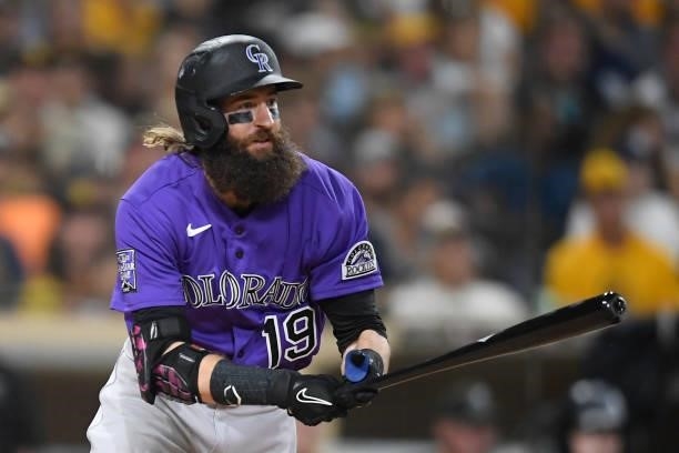 Charlie Blackmon of the Colorado Rockies hits an RBI single during the fifth inning of a baseball game against the San Diego Padres at Petco Park on...
