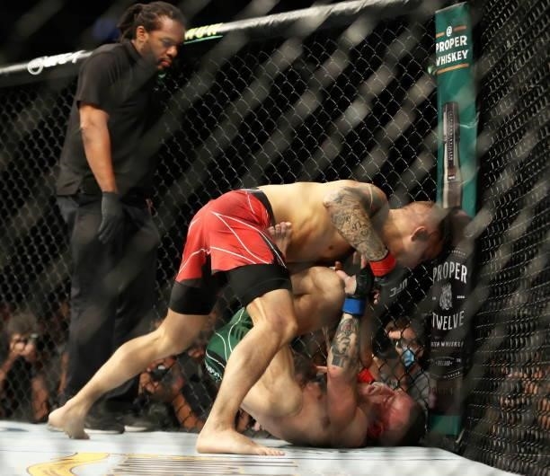 Nevada , United States - 10 July 2021; Dustin Poirier, left, and Conor McGregor during their lightweight fight during the UFC 264 event at T-Mobile...