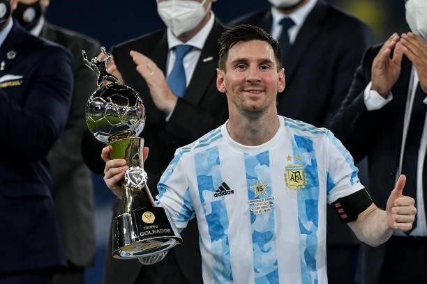 Lionel Messi player from Argentina lifts the champion's cup during an award ceremony at the end of the match against Brazil at the Maracana stadium...